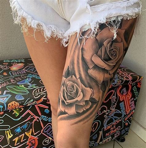 tatuagem feminina de flor na coxa|Tatuagens Florais na Coxa: Inspirações e Significados